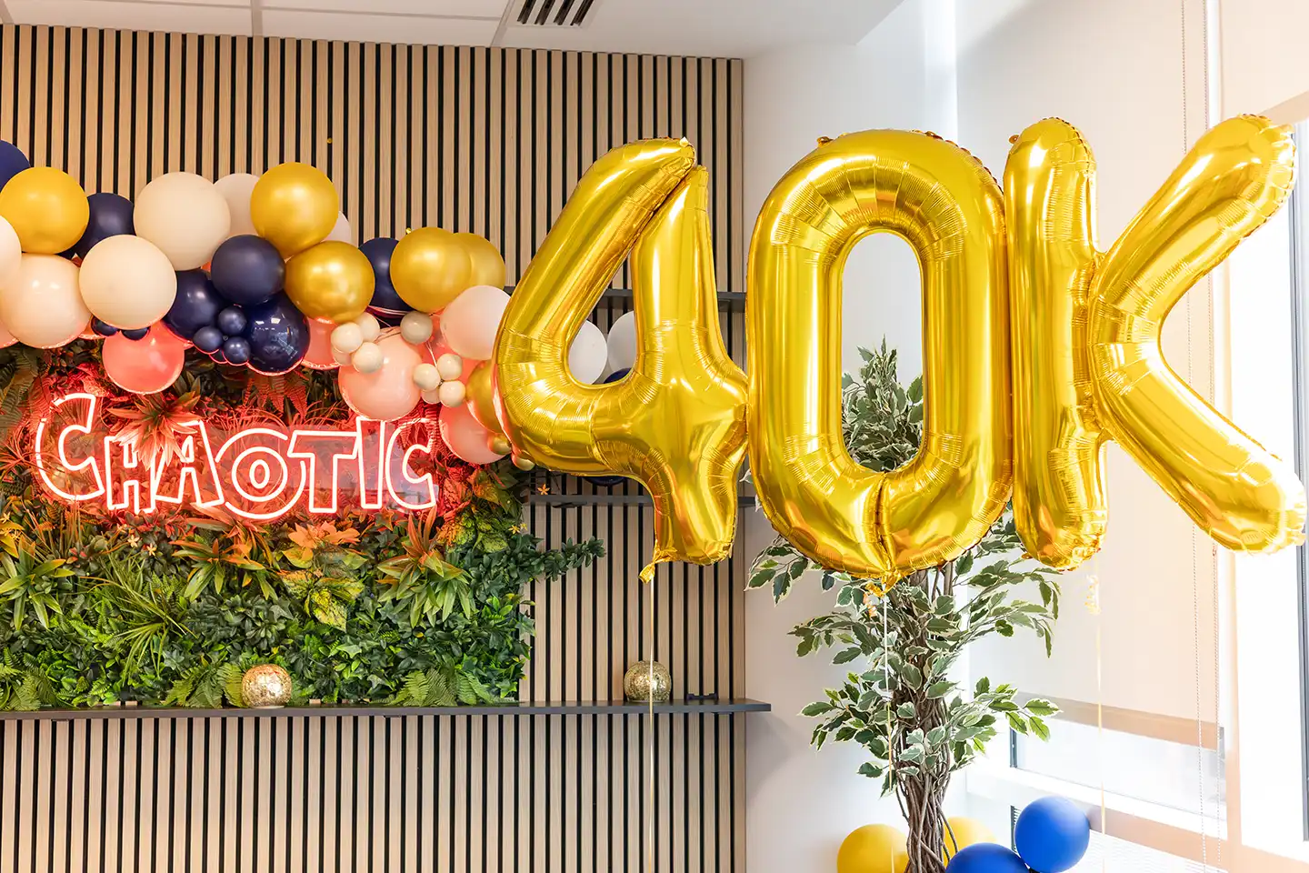 40k balloon signage in chaotic head office 